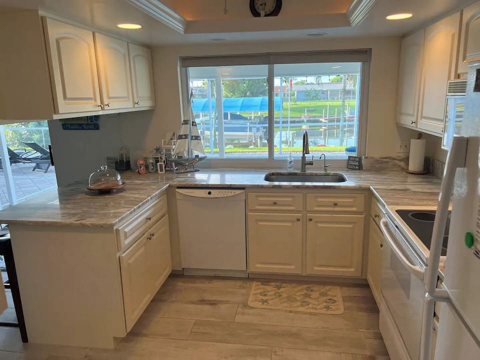 Fully equipped kitchen with everything you'll need. Bright sunny view all day.