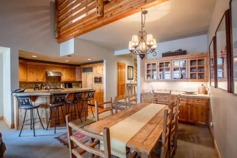 Large dining room table with seating for 8.