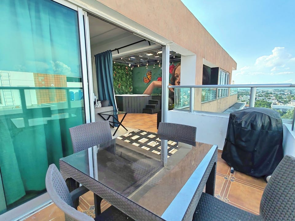 3rd lvl: private terrace with dining area, and BBQ next to living and jacuzzi.