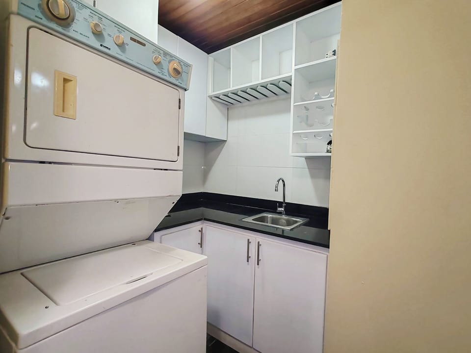 Laundry area on 2nd lvl next to hot-tub area.