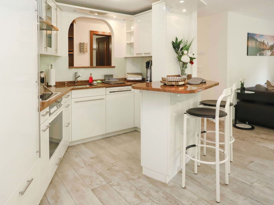 Countertop, Furniture, Cabinetry, Tap, Sink, Building, Houseplant, Wood, Kitchen, Plumbing Fixture