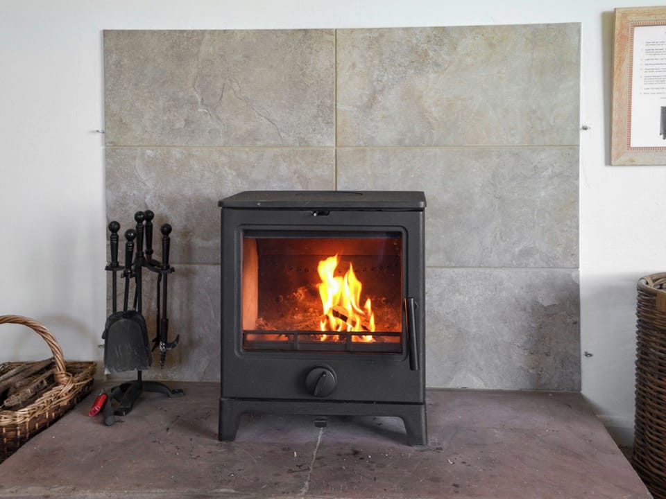 Angerton Cottage log burner sitting room | Angerton Cottage, Carlisle