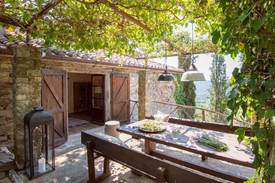 Seating area between the main house and the pool area 