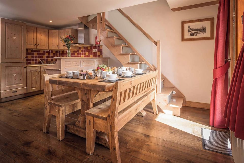 Sit down with family and friends in the rustic dining area.