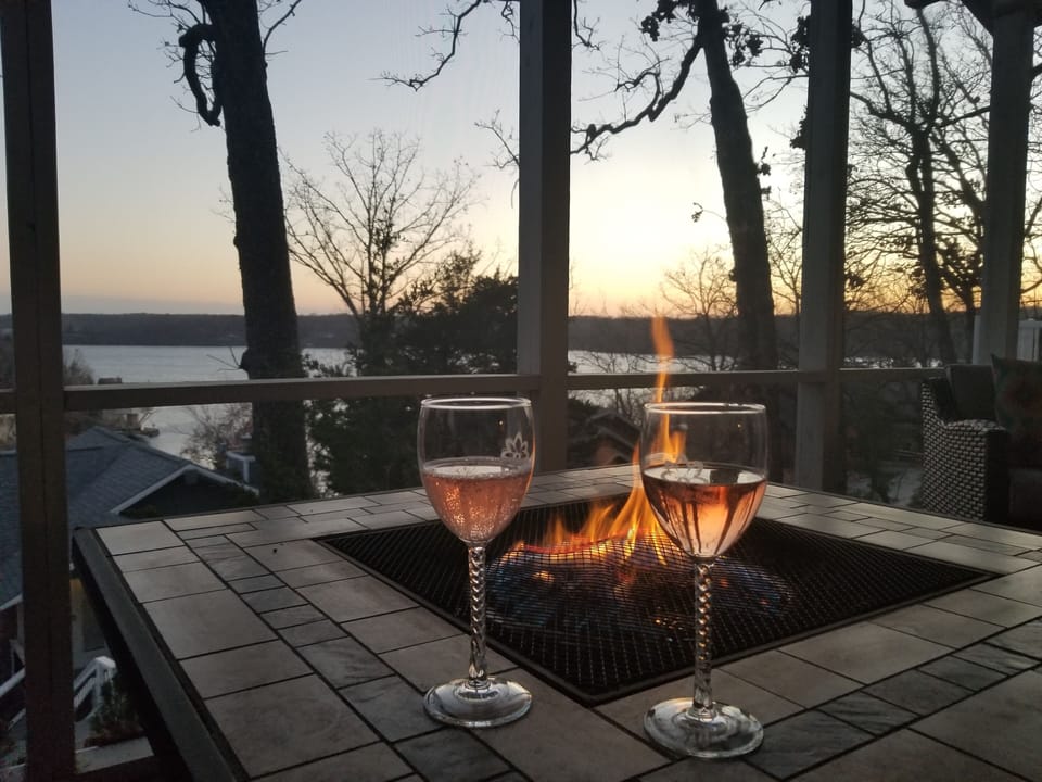 Enjoy drinks and a great view from the screened in porch