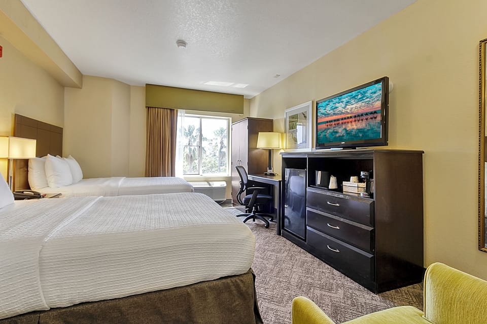 Kick back with flat-screen TV and convenient in-room refreshments.