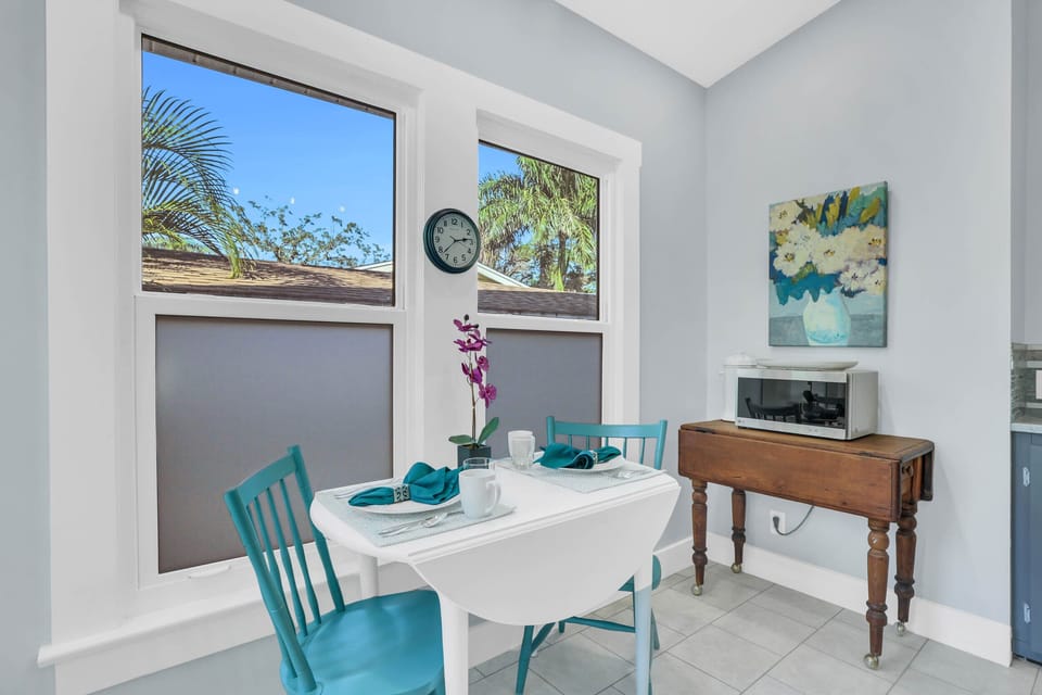Sunny breakfast nook in the kitchen. Notice the privacy windows. 