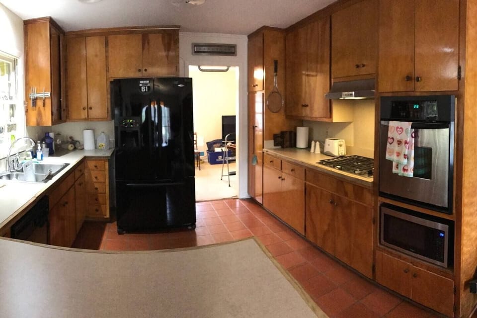 Gas cooktop with vent-a-hood.