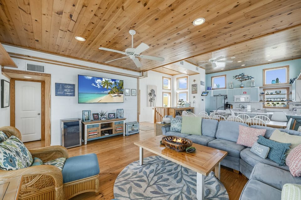 Open, airy living room designed for lounging, movie nights, and together time.