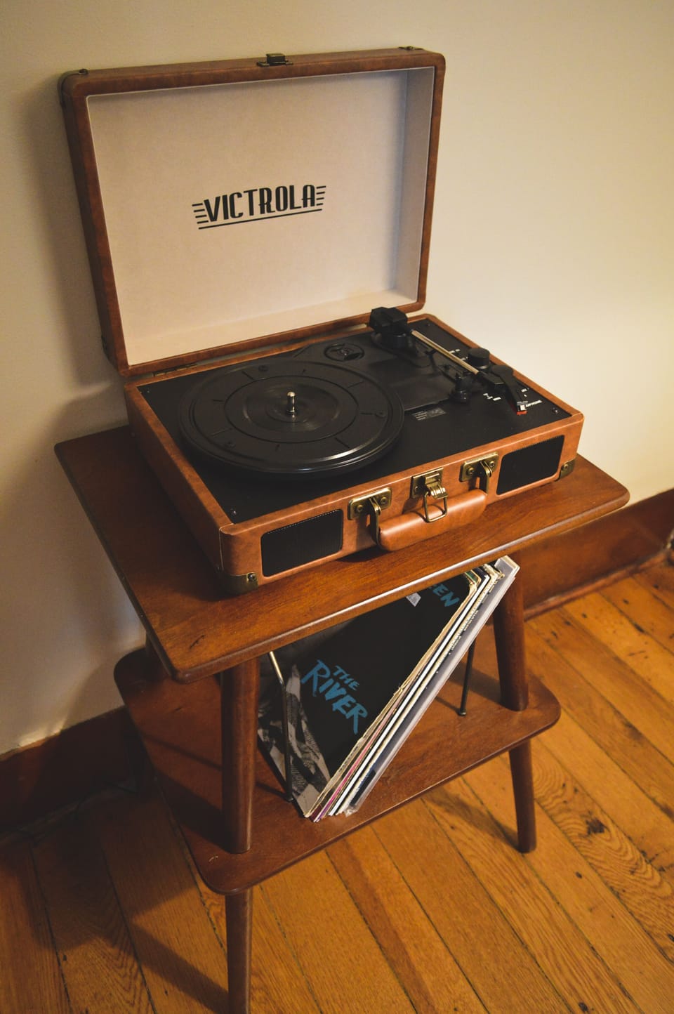 Record player with selected records.  Located in the living room.