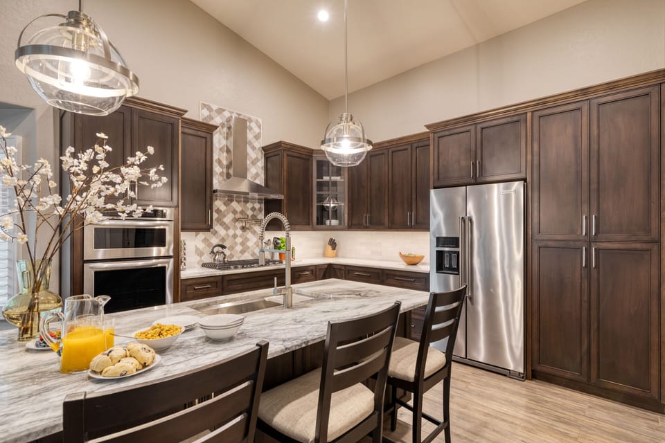 Barstool seating at the kitchen island.