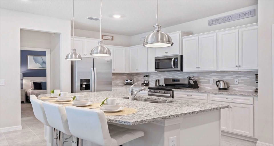 The large chef's kitchen comes equipped with everything you could need