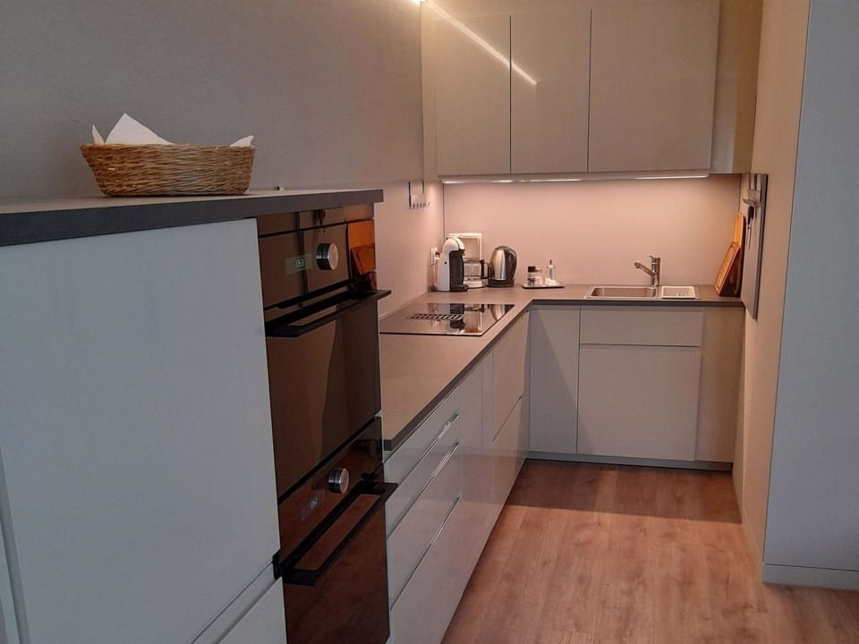 Cabinetry, Countertop, Property, Sink, Building, Wood, Tap, Kitchen, Kitchen Stove, Architecture