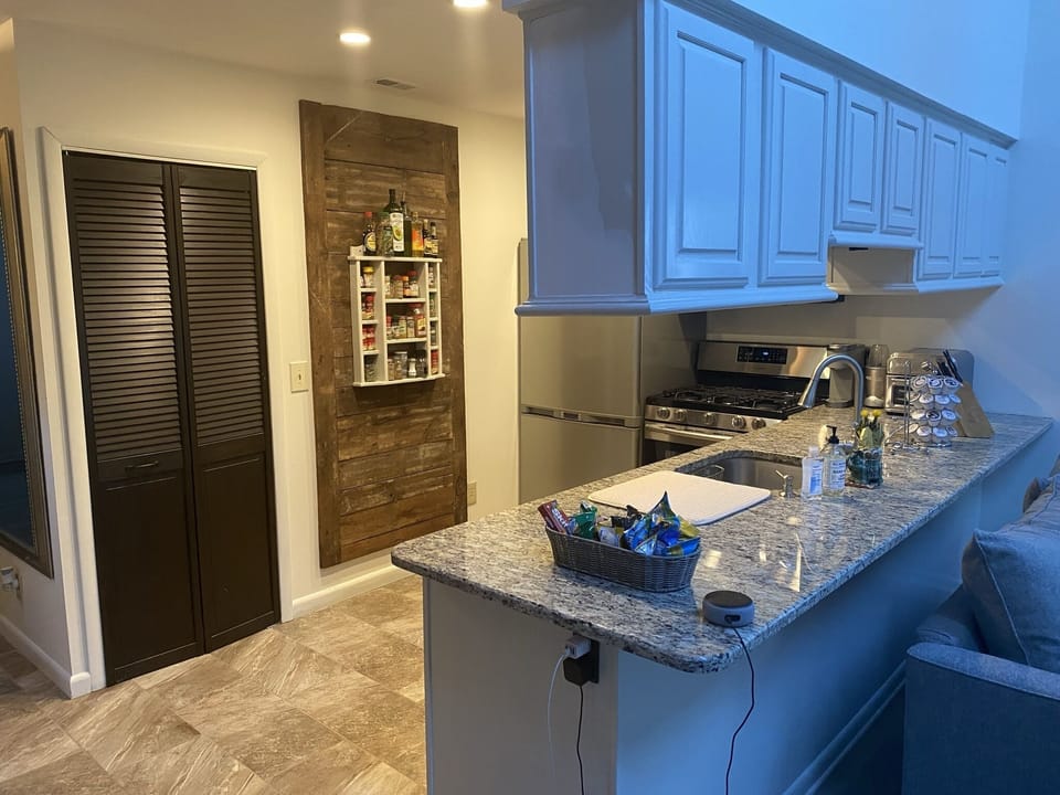 Kitchen fully stocked with pots, pans, dishes etc…