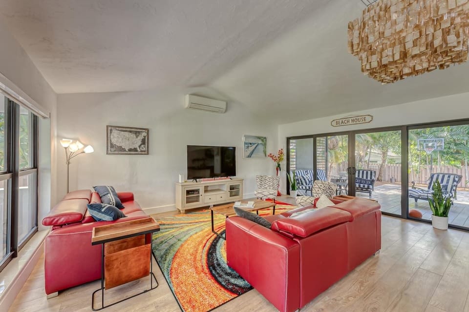 Open layout Family Room/Dining Room with open Kitchen overlooking expansive back yard. 