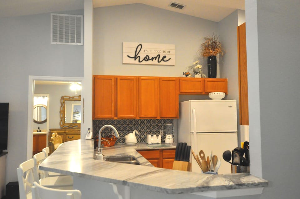 Quartz countertops and handmaid Spanish tile delight!