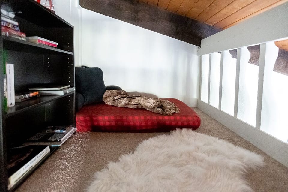 Reading loft. Cozy crib-size mattress for lounging and reading or meditating.