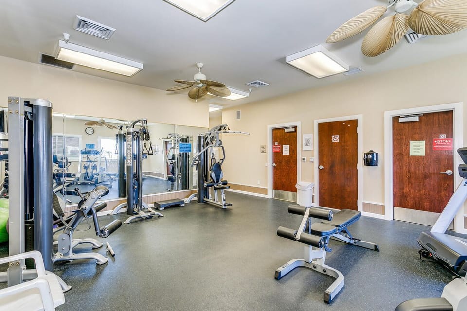 Stay active during your getaway in this well-equipped fitness center, complete with a variety of machines for cardio and strength training. Tropical ceiling fans and bright lighting make your workout comfortable.