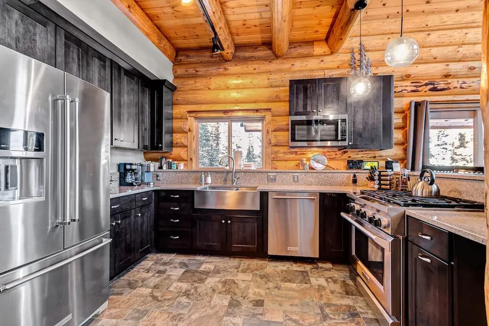Chef's Kitchen - 
A chef's dream with premium appliances and thoughtful amenities. Whether you're whipping up pancakes for the kids or hosting a full dinner, this kitchen makes every meal an experience.