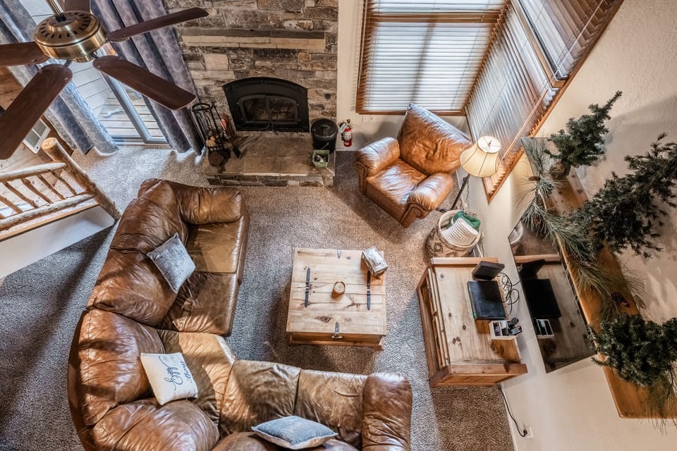 Living Room / Flat Screen TV / Wood Burning Fireplace