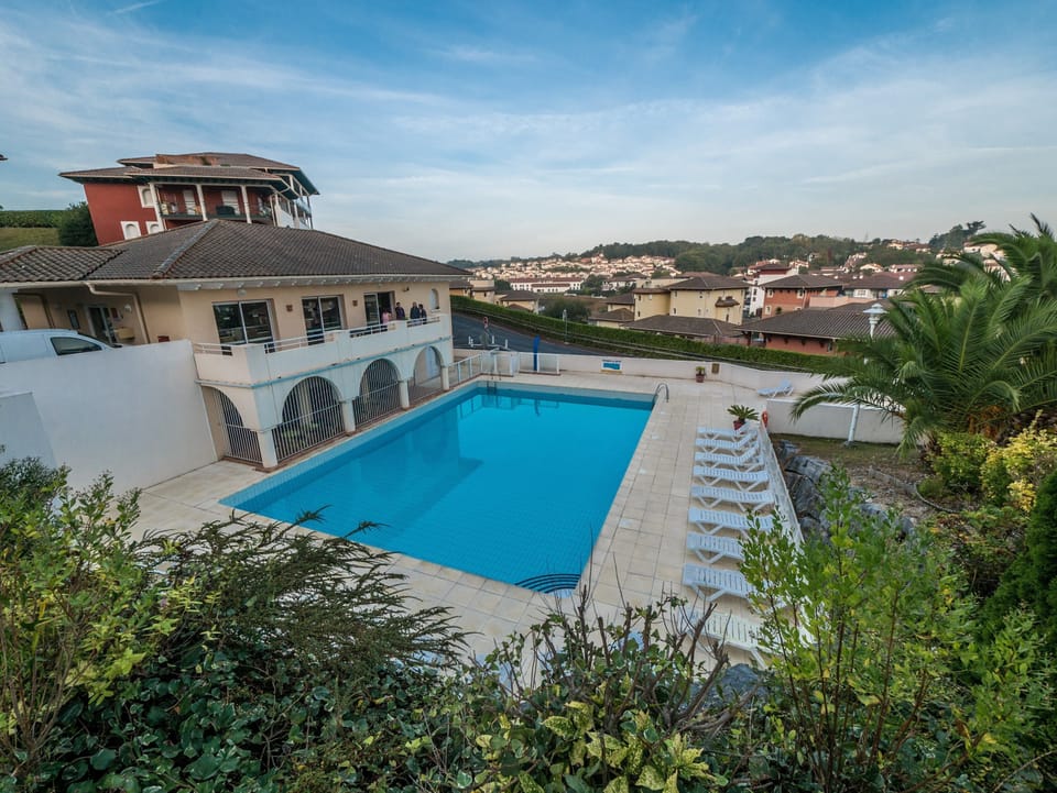 Take in gorgeous views while lounging around the on-site outdoor pool.