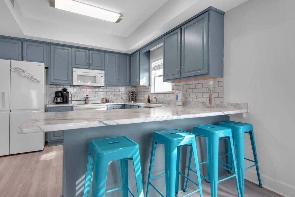 Gather around island for meals and memories