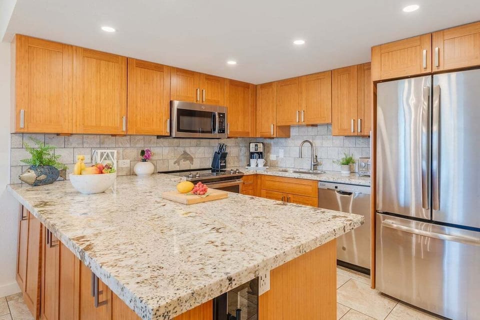 Fully equipped kitchen with stainless steel appliances