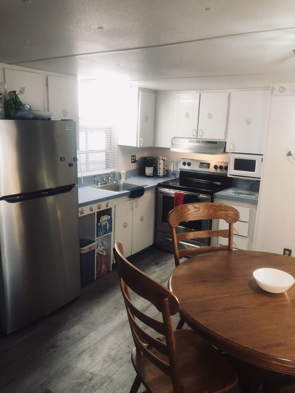 Kitchen Area- with coffee station, plates,cups,silverware,pots/pans 