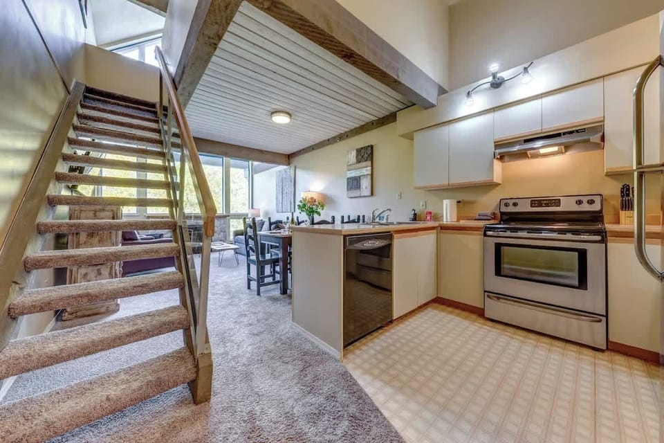 Stair to Loft room beside Full Kitchen