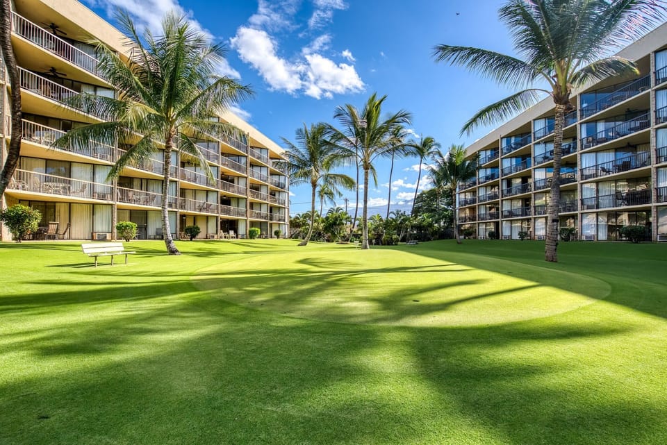 Maui sunset features a manicured lawns