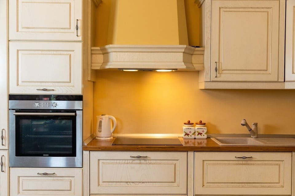 Fully equipped kitchen in a Croatia luxury pool villa Red Rose for vacation with kids in Dubrovnik