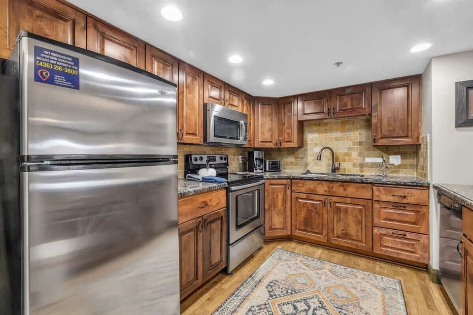 A fully-equipped kitchen greets you when you enter the home, outfitted with everything you will need for preparing meals at home.