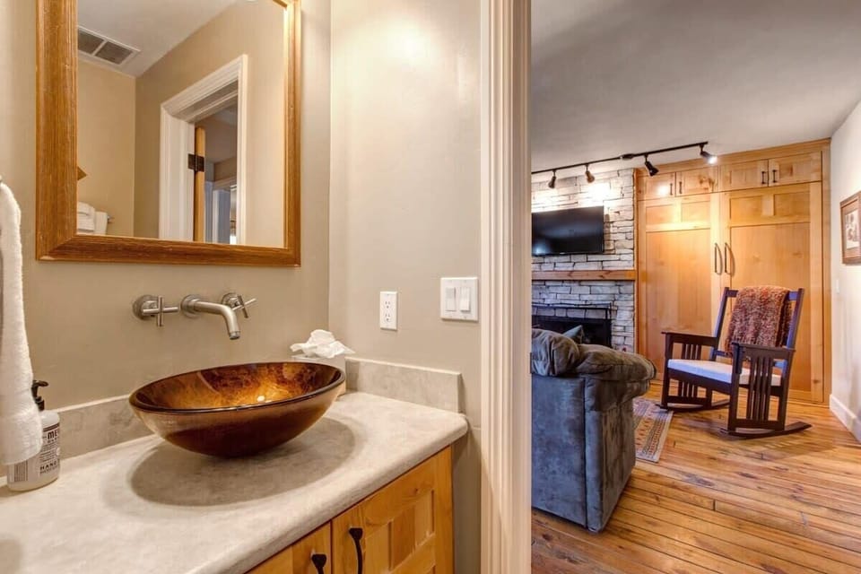 Full bathroom with single vanity and a walk-in shower