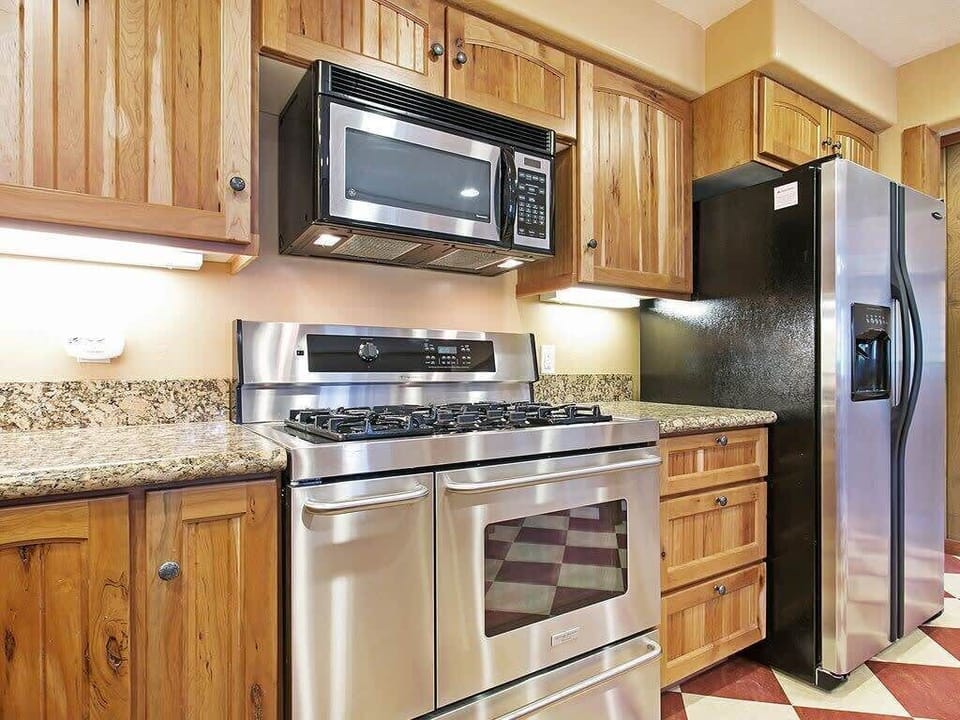 Stainless steel appliances, lots of light and ample counter and cabinet space will delight the chef in your group.