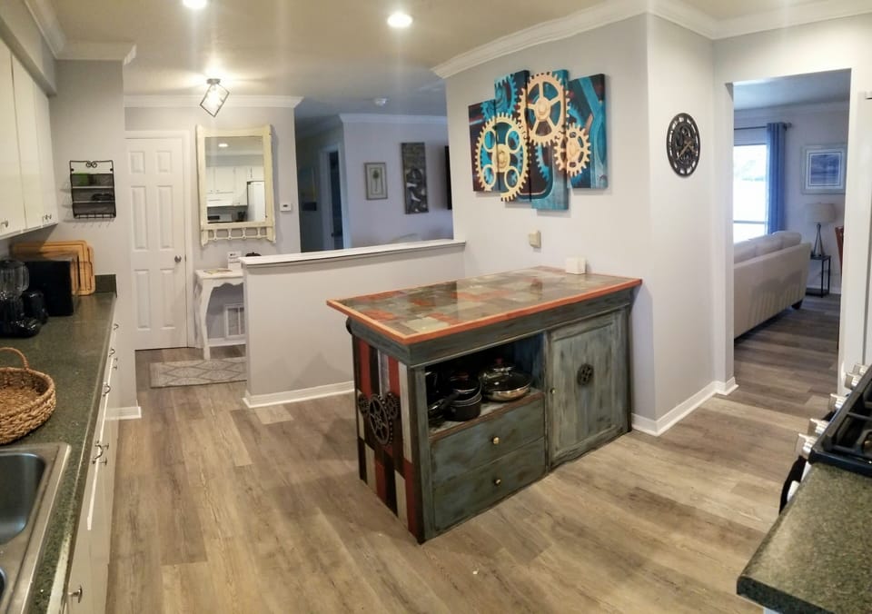 Large, open spacious kitchen with great multi-purpose island with 2 stools