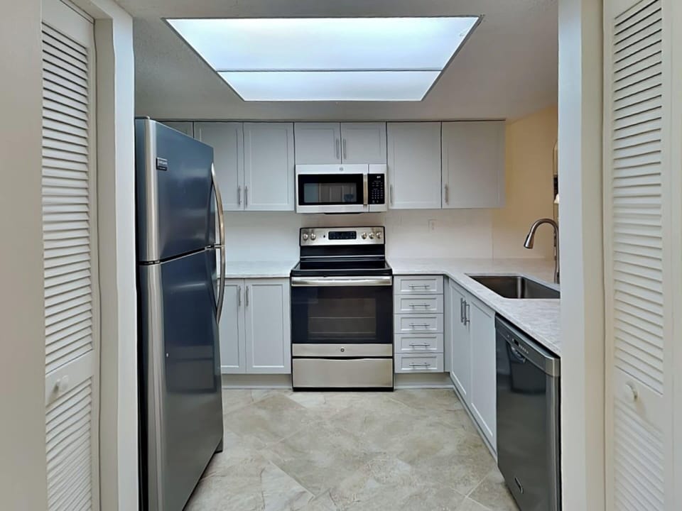 Fully Equipped Kitchen with Stainless Steel Appliances