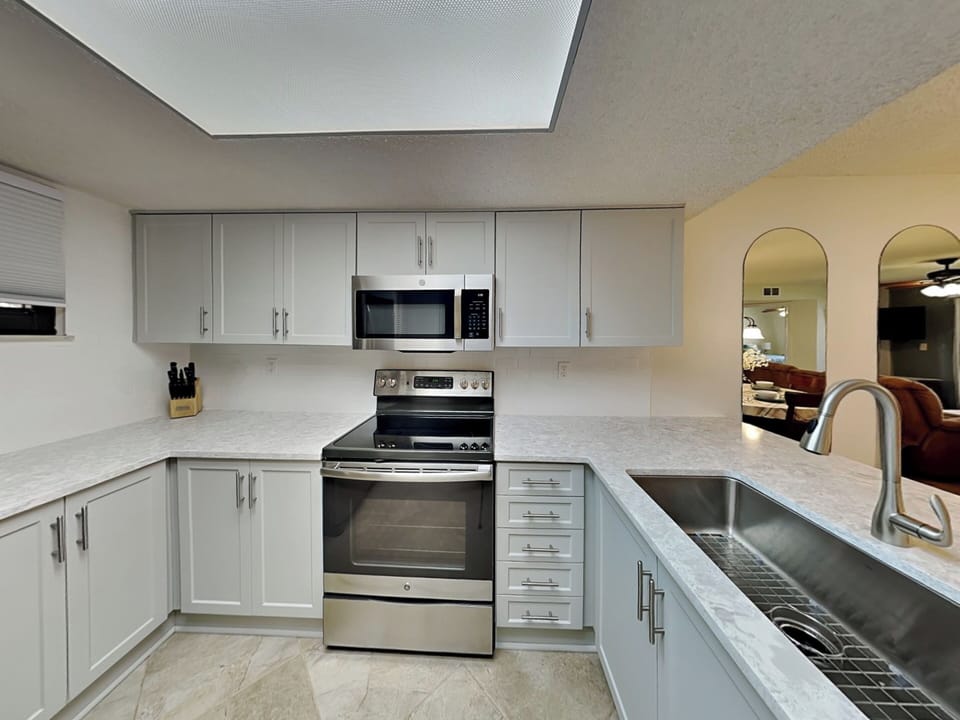 Fully Equipped Kitchen with Stainless Steel Appliances