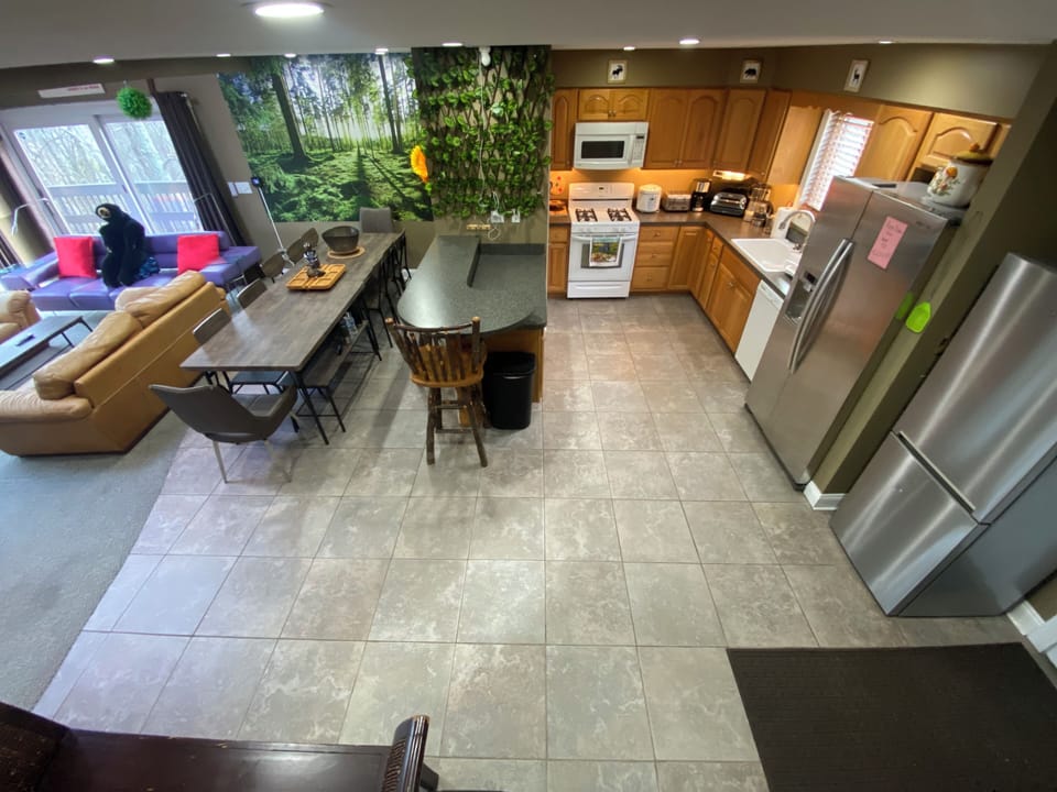 Kitchen area and dining area within living room