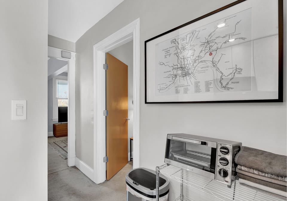 Kitchen artwork features the original Cincinnati street car map that the house's history is based off of!