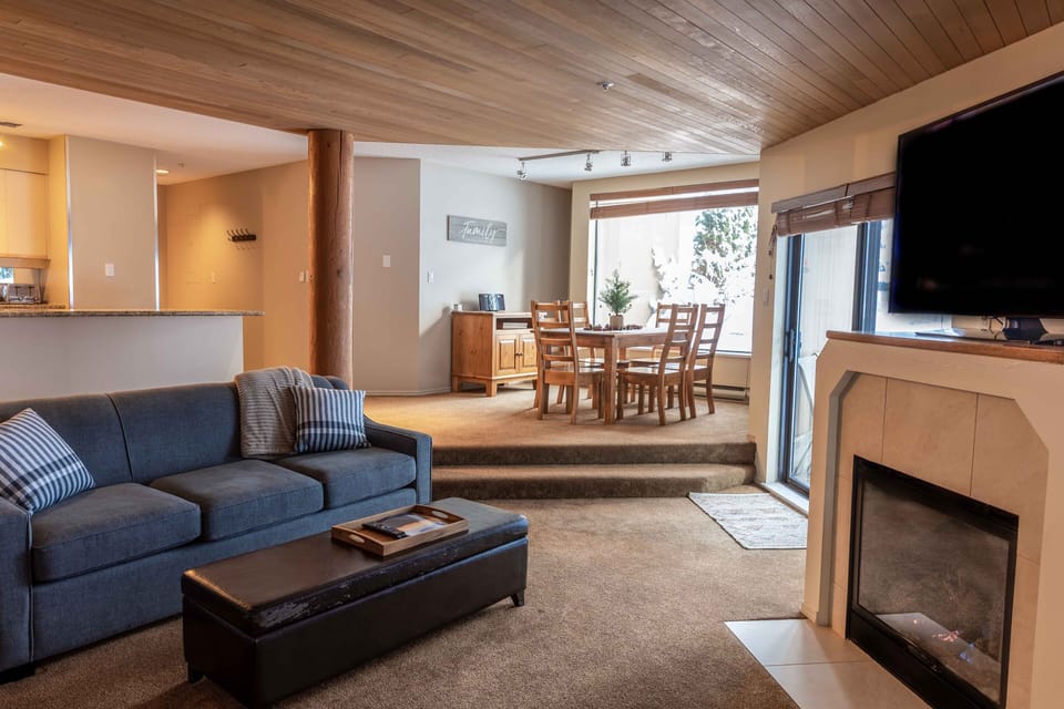 sunken living room, sofa bed and gas fireplace