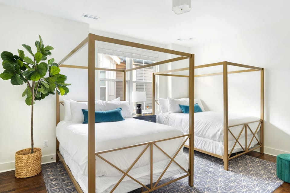 Bedroom 3 features two double beds.