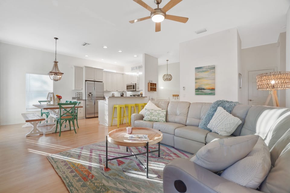 Leather sectional couch with powered end recliners. 