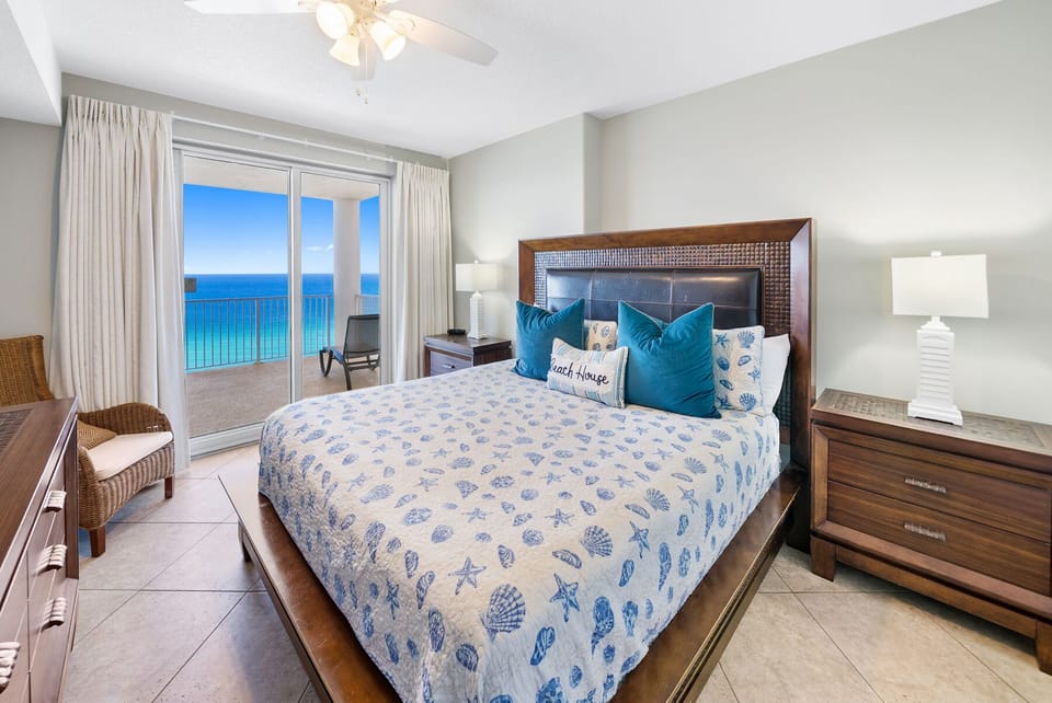 Wake up to stunning ocean views from your coastal bedroom, where tropical breezes flow through and beach-themed touches invite peaceful mornings.
