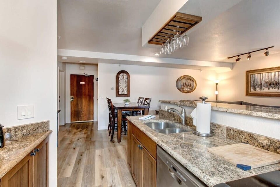 This view from the kitchen highlights its close proximity to the dining area, making it easy to move from stove to table.