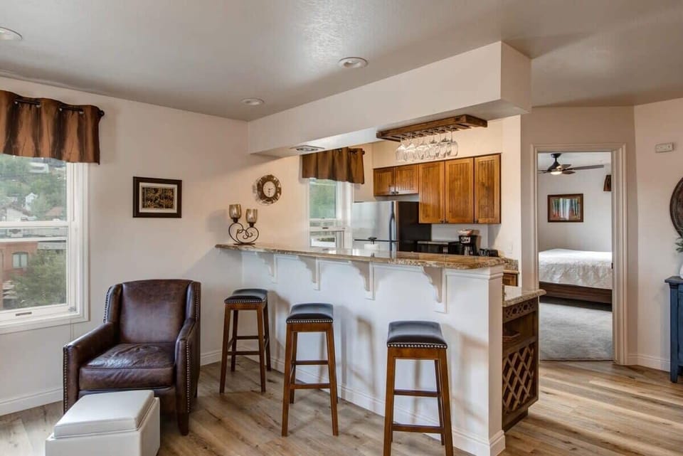 This lovely kitchen features stainless steel appliances, an eat-in bar/serving area with seating for three and is located just off of the living and dining areas, so you can grab a snack or whip up a meal and not miss a thing.