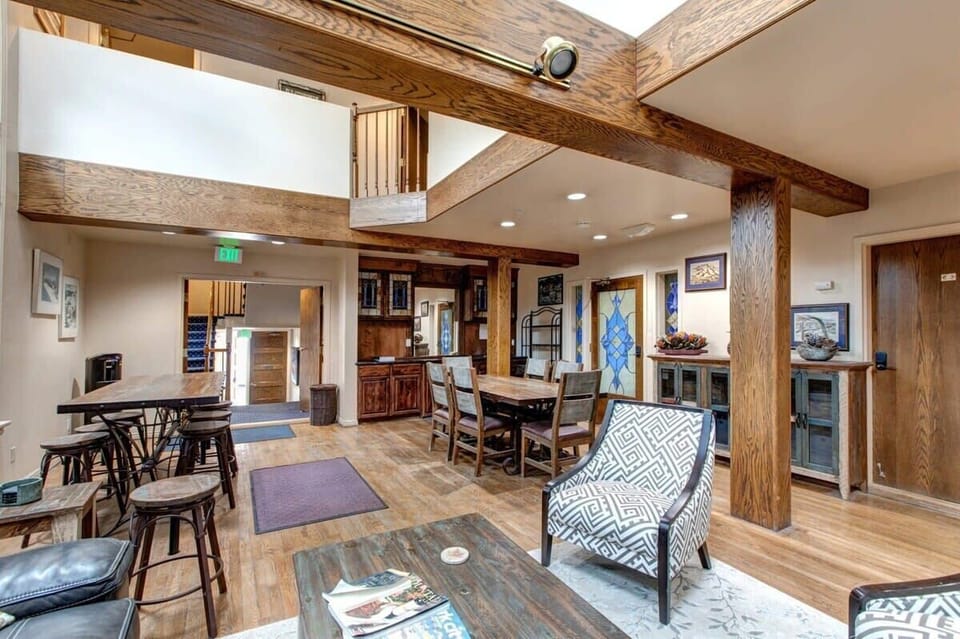 A stunning, light-filled common lounge space in the Blue Church Lodge is available for your use and features cozy seating areas, a fireplace and striking stained glass.
