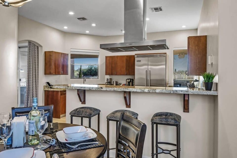 Seating peninsula and smaller high top breakfast table