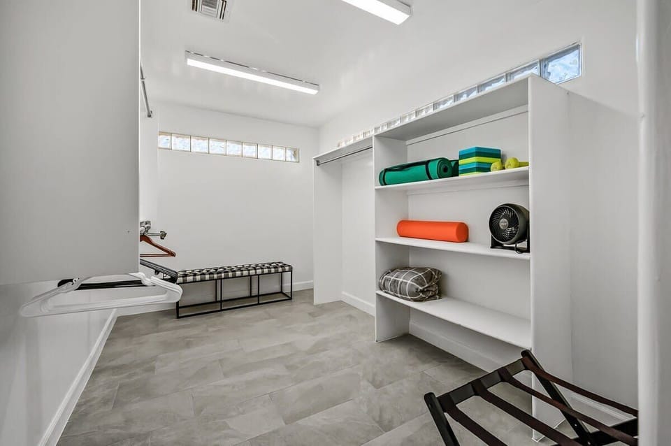 Large walk in closet in master bathroom
