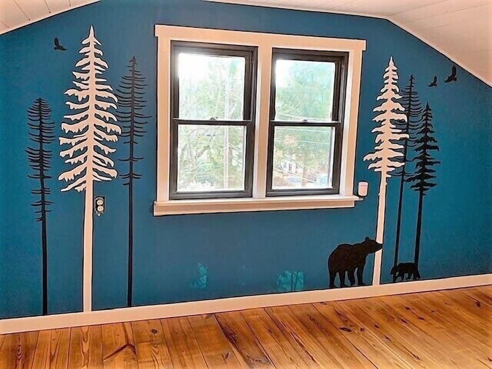 Upstairs bedroom 2 gets you a peek at the lake which is across the street