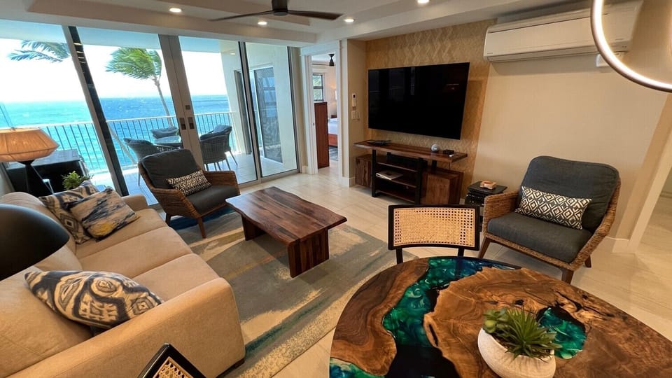Living room and lanai view from dining area.